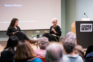 Image of Curator Christina de Leon and Rebeca Mendez, sitting on stage at Cooper Hewitt