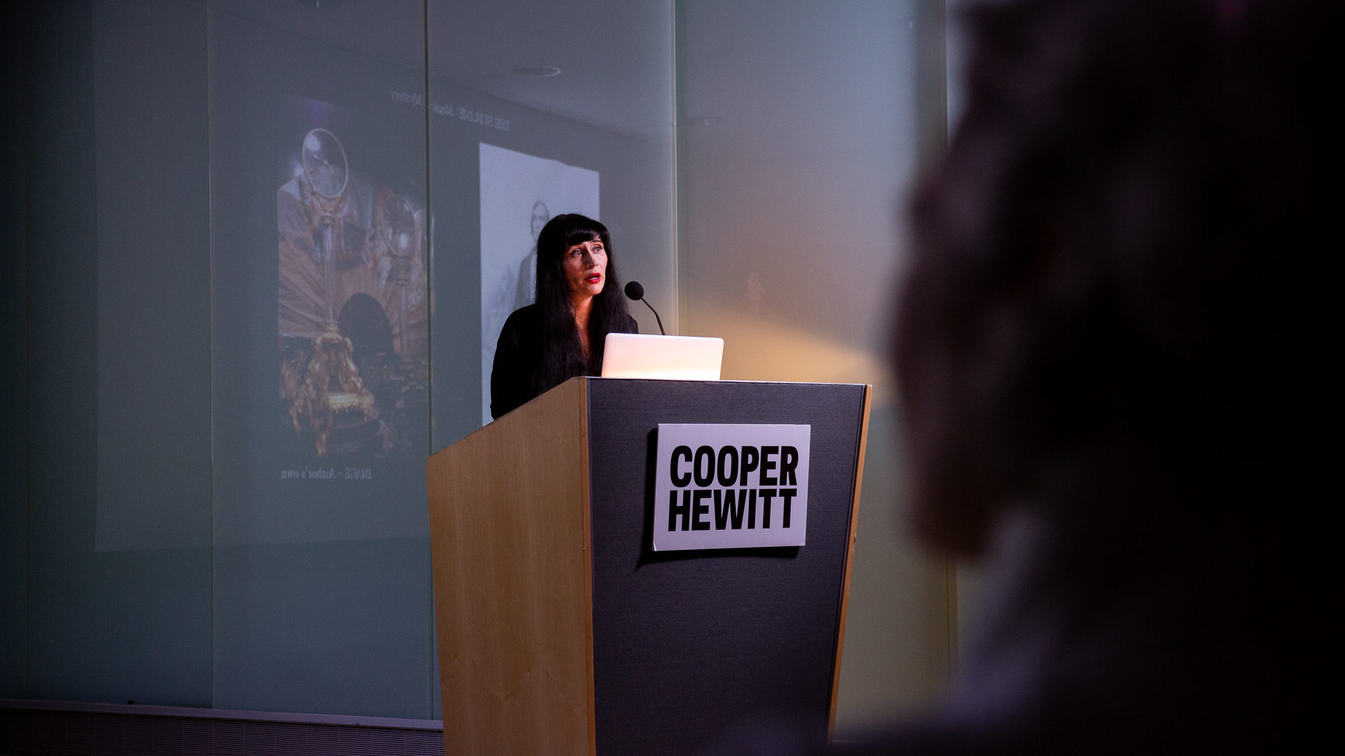 Image of Brittany Nicole Cox, horologist, on stage at Cooper Hewitt