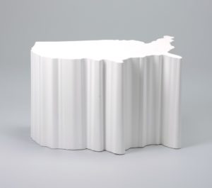 Image features a small white plastic table molded in the shape of the continental United States. Please scroll down to read the blog post about this object.