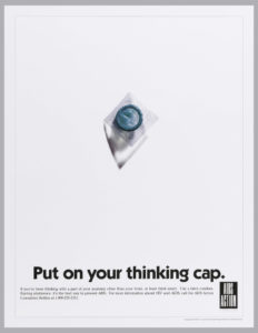 Image features poster showing a blue condom in clear packaging on a white background, above the message, "Put on your thinking cap." Please scroll down to read the blog post about this object.