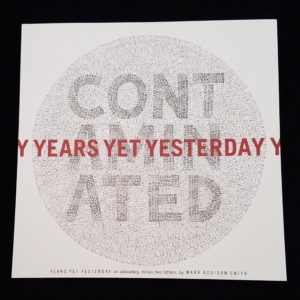 Image features the cover of the book Years Yet Yesterday. "Y YEARS YET YESTERDAY Y," in red letters is superimposed over the word "Contaminated"in a gray circle on a white background. Please scroll down to read the blog post about this object.