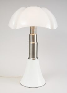 Image features a lamp composed of a curved, white translucent shade on a segmented stainless steel column with a white base. Please scroll down to read the blog post about this object.