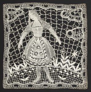 Image features: Two round doilies: one with a fanciful bird, the other with a stylized palm tree. Square lace inserts for a curtain contain a female figure in traditional dress, the other has a male figure with outstretched arms and an owl. Please scroll down to read the blog post about this object.
