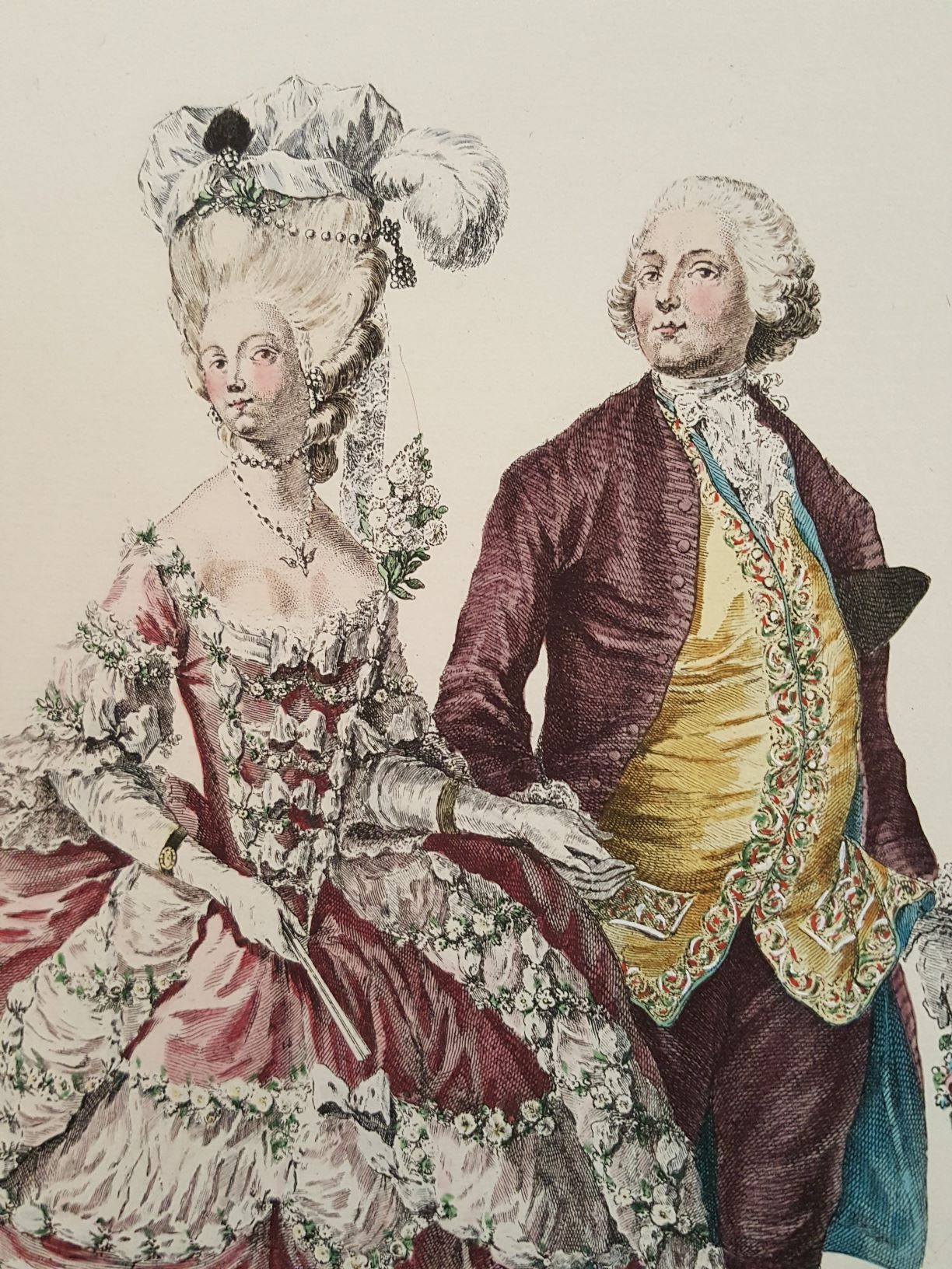 This image features woman and man wearing wigs, very elegant, fancy clothing. man wearing yellow waistcoat.