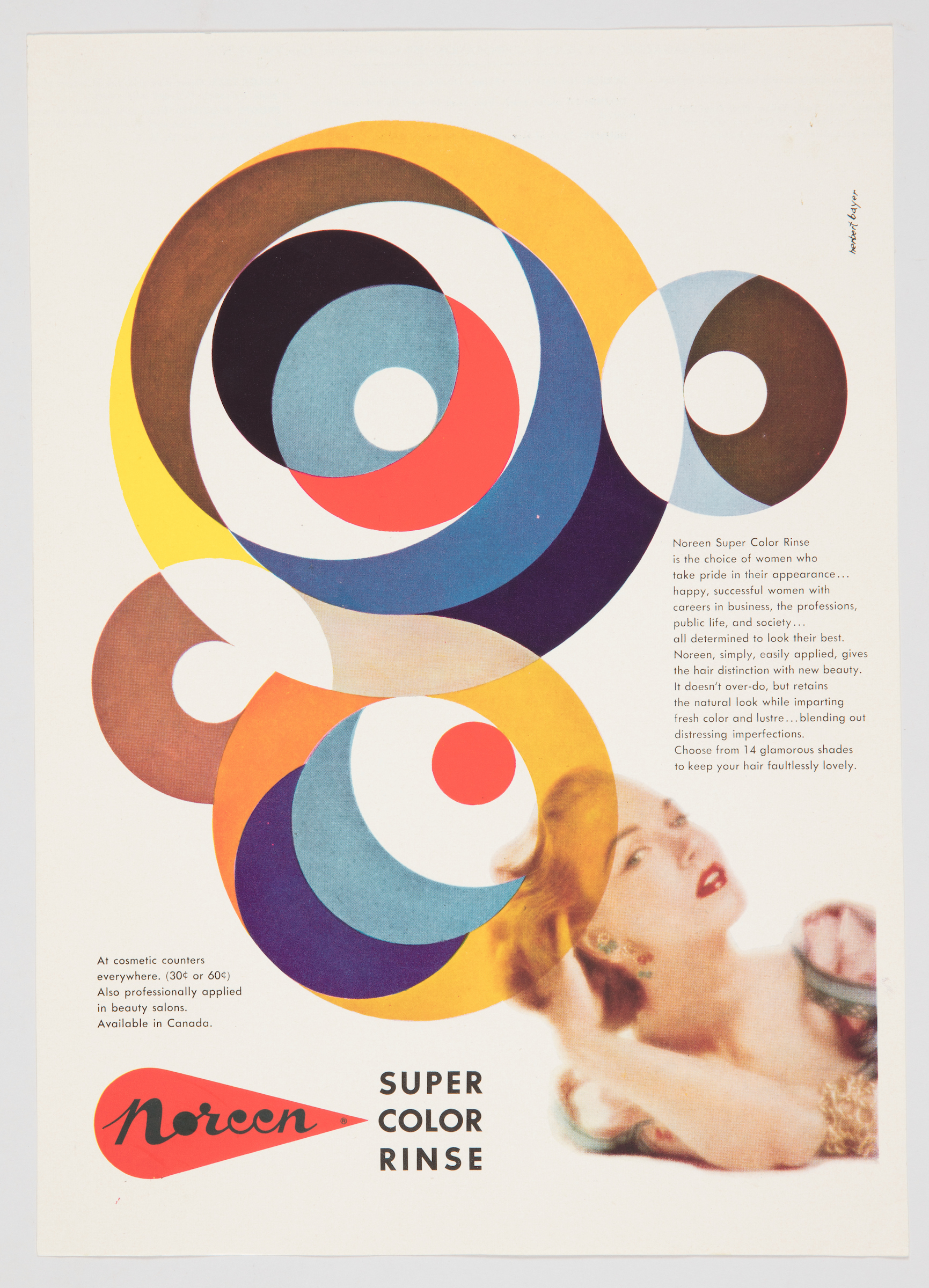 In a vintage advertisement for a magazine, a model wearing ruby-red lipstick tousles her blonde hair. The form of her polished curls is amplified in a colorful abstract montage of pale blue, white, orange, and black circles. The circles overlap to create a figure 