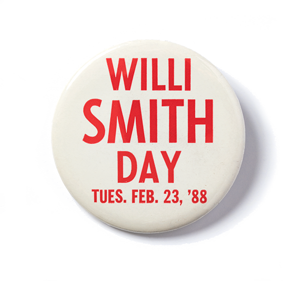 A pin with the red words on a white background, saying Willi Smith Day Tues. Feb 23, '88