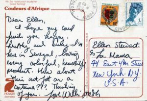 The back of a postcard titled Couleurs d'Afrique with Senegalese stamps and a handwritten note, addressed to Ellen Stewart