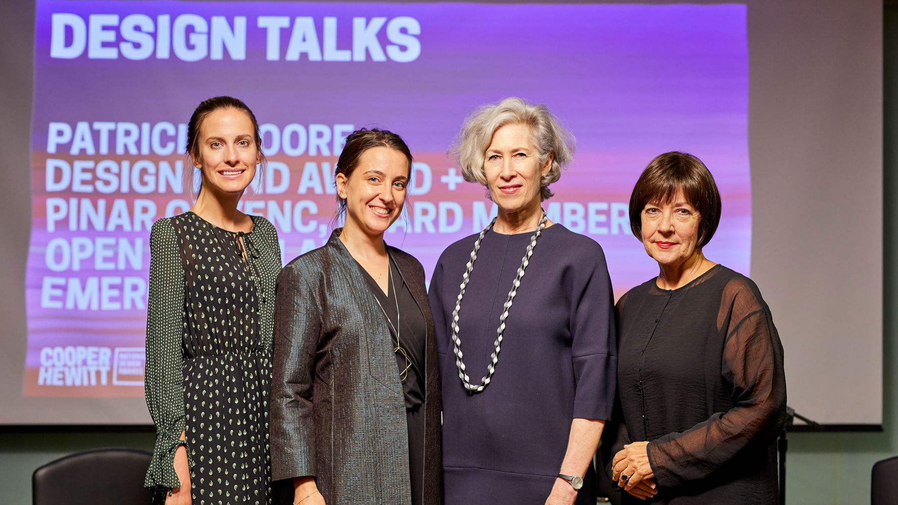 Image of four women looking at the camera.