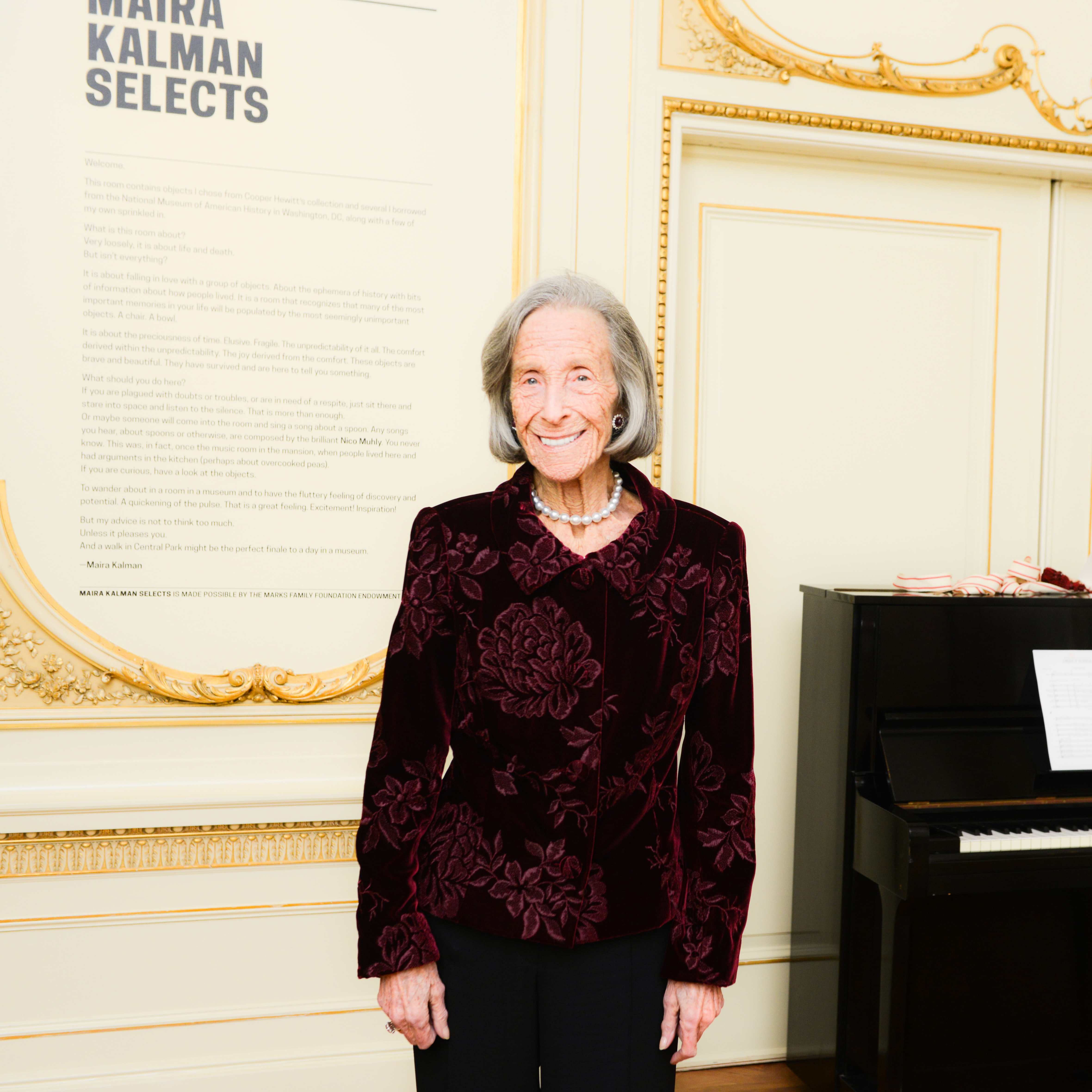 Barbara Mandel smiling in the Cooper Hewitt galleries