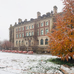 The south-facing edifice of Carnegie Mansion and the snow-covered garden on a winter day