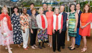 Cooper Hewitt's dedicated Board of Trustees, including Barbara Mandel, dressed in vibrant attire at the Cooper Hewitt Garden Party