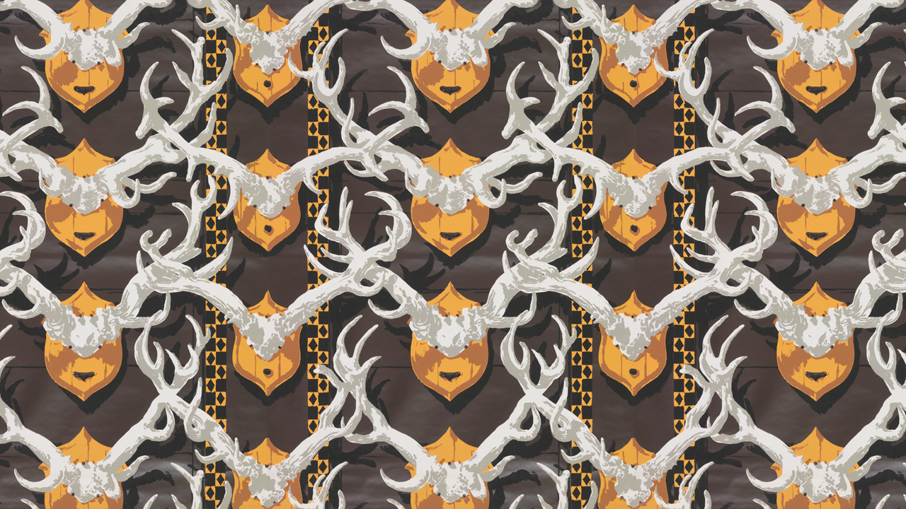 A pattern shows white mounted horns on orange mounts on a brown background, creating a hunting lodge effect