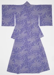 This is a Kimono. It was dyed by Masao Aida and carved by Isao Uchida.