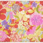 Drawn, watercolor textile design made up of several varieties of flowers in crimson, pale fuchsia pink, sky-blue, white and violet, with gold and forest-green leaves against a white background.