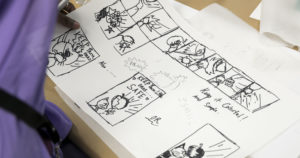 This image shows a storyboard with drawings.