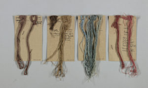 Image features: Samples of yarns dyed by members of the Society, affixed to the backs of admission tickets to the Annual Exhibition of 1908. Recipes for some colors are written below. Please scroll down to read the blog post about this object.