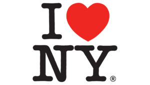 The logo consists of the capital letter I, followed by a red heart symbol, below which are the capital letters N and Y, set in the rounded slab serif typeface American Typewriter.