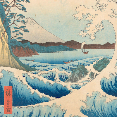 Japanese print of waves and a mountain in the distance