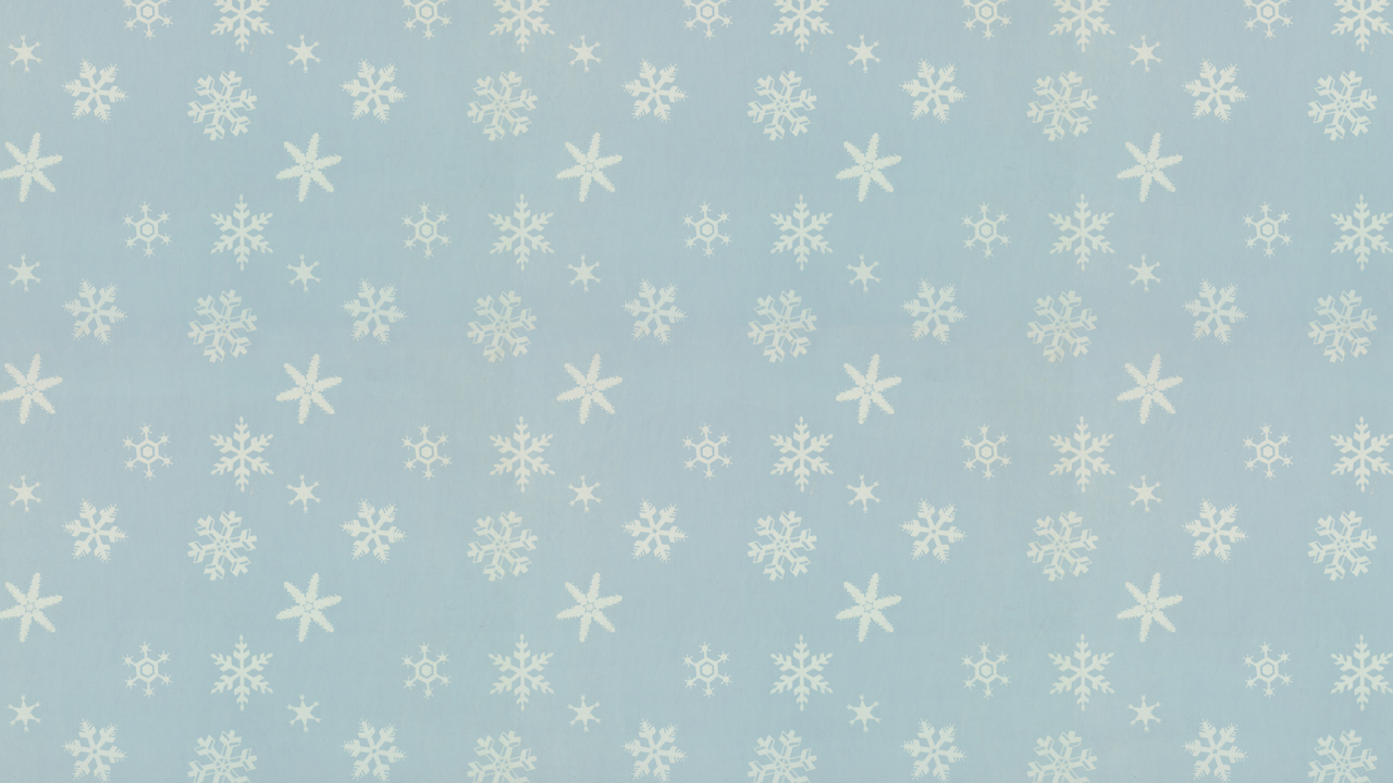 Pattern of snowflakes on a light blue background