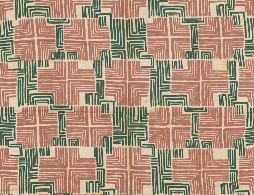 Heavy-weight natural-colored linen with repeating pattern of crosses and partial crosses formed by closely set L-shaped lines of varying widths in dark green and dusty pink.