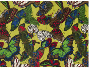 Length of cotton velvet printed with a large-scale design of naturalistic butterflies. In black, blue, green, red, and white on a yellow-green ground.