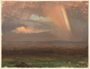 A mid-toned landscape with billowing pink-tinged grey clouds and a stripe of vibrant rainbow cascading from the top right above deep green and earth brown plains and blue-grey mountains.
