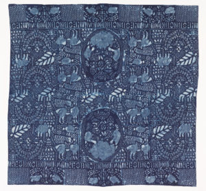 Dark blue and white textile with a highly intricate repeating pattern of minuscule dots, leaves, fantastical creatures, and other designs.