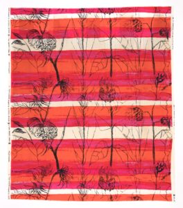 A textile covered in black sketches of spindly, drooping sunflowers against a background of pink, orange, and white horizontal stripes.