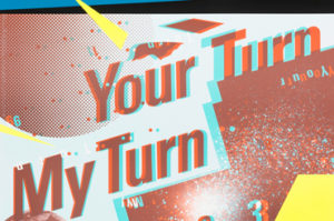Abstract, collage-like poster with [Your Turn, My Turn, 1983] printed in large red letters across the center. Most of the poster is rendered in offset red and blue, giving the effect of a technological glitch.