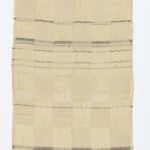 Long vertical textile featuring a checkered pattern in two barely distinguishable shades of light tan interspersed with horizontal black lines of varying thicknesses.