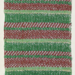 Textile made of cotton with alternating color patterns. Patterns visible are candy cane stripes, followed by solid green and red lines.