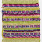 Horizontal woven rows made of different materials of different thicknesses and vibrant colors form a heavily textured, mixed media fabric.