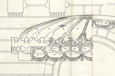 Detail of an elevation drawing of the front of a house, with a dome-like canopy covering a doorway.
