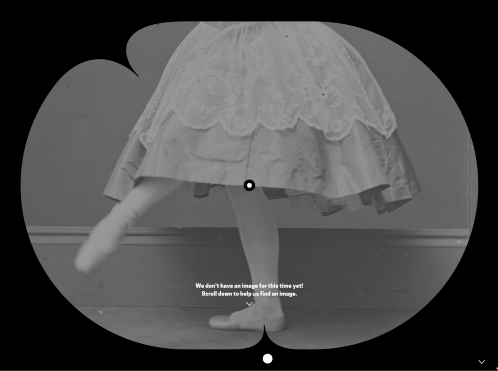 A black and white image of a ballerina in a full skirt and toe shoes, bordered by the black art clock frame. Towards the bottom of the image, white text reads