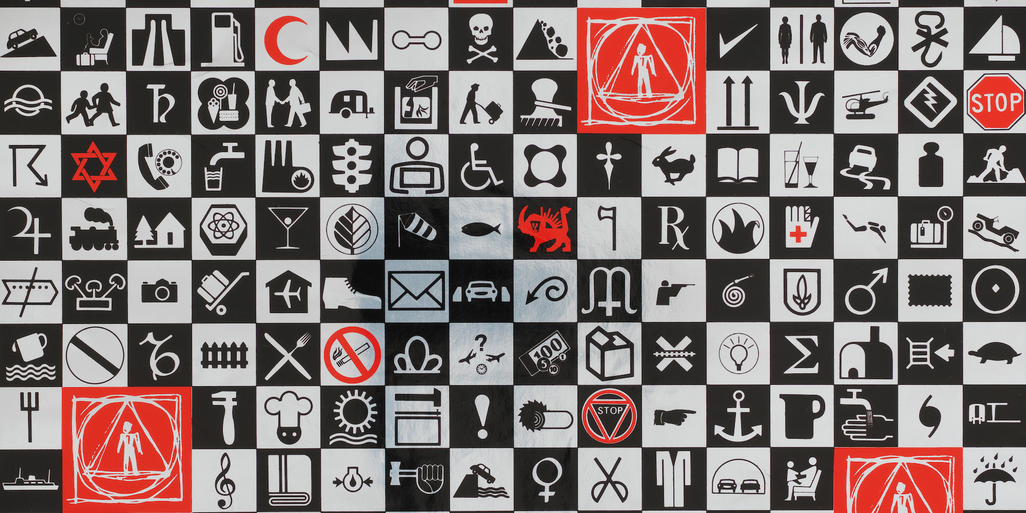 Grid of various symbols appearing largely in black and white, with a few symbols marked in red.