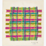A small sample of fabric with colorful strips of fuchsia, green, blue, and yellow woven between light tan reeds.