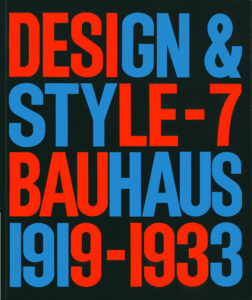 Large red and blue colored text reading “DESIGN & STYLE-7 BAUHAUS 1919-1933” on a black background.