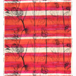 A textile striped horizontally with the pinks and oranges of a sunset and covered in black sketches of leaves and flowers.