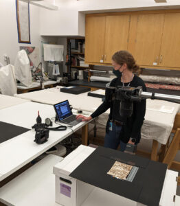Imaging scientist E. Keats Webb investigating the use of infrared imaging to determine whether lined Stradanus drawings have black chalk drawings on the verso.
