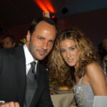 National Design Winner Tom Ford and Sarah Jessica Parker sitting at the National Design Awards dinner.