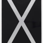 Poster with a large grey X on a black background with “November” in small white letters at bottom. Includes a thin grey border.