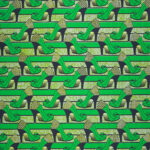 Textile printed with vibrant repeating pattern of high heeled shoes in bright greens and black on white.
